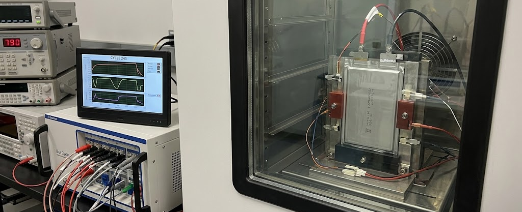 Image dipicting an ev battery cell undergoing cycle testing.